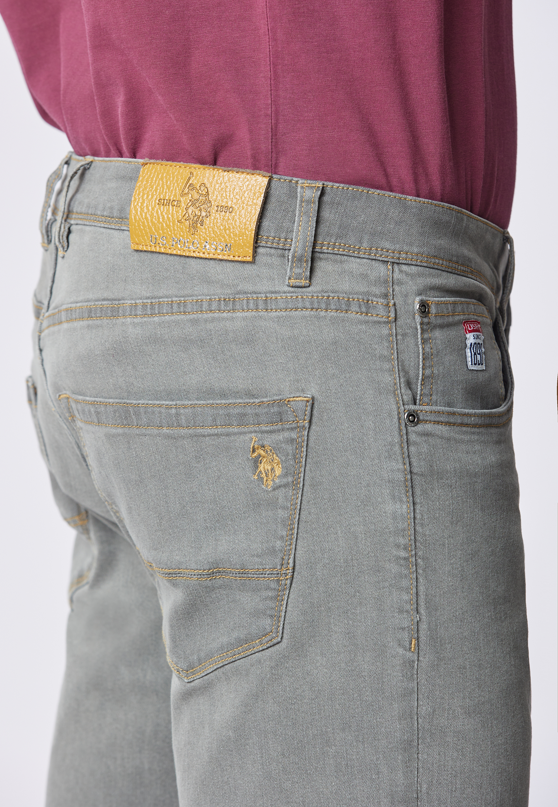 Pantalone denim cinque tasche tapered fit