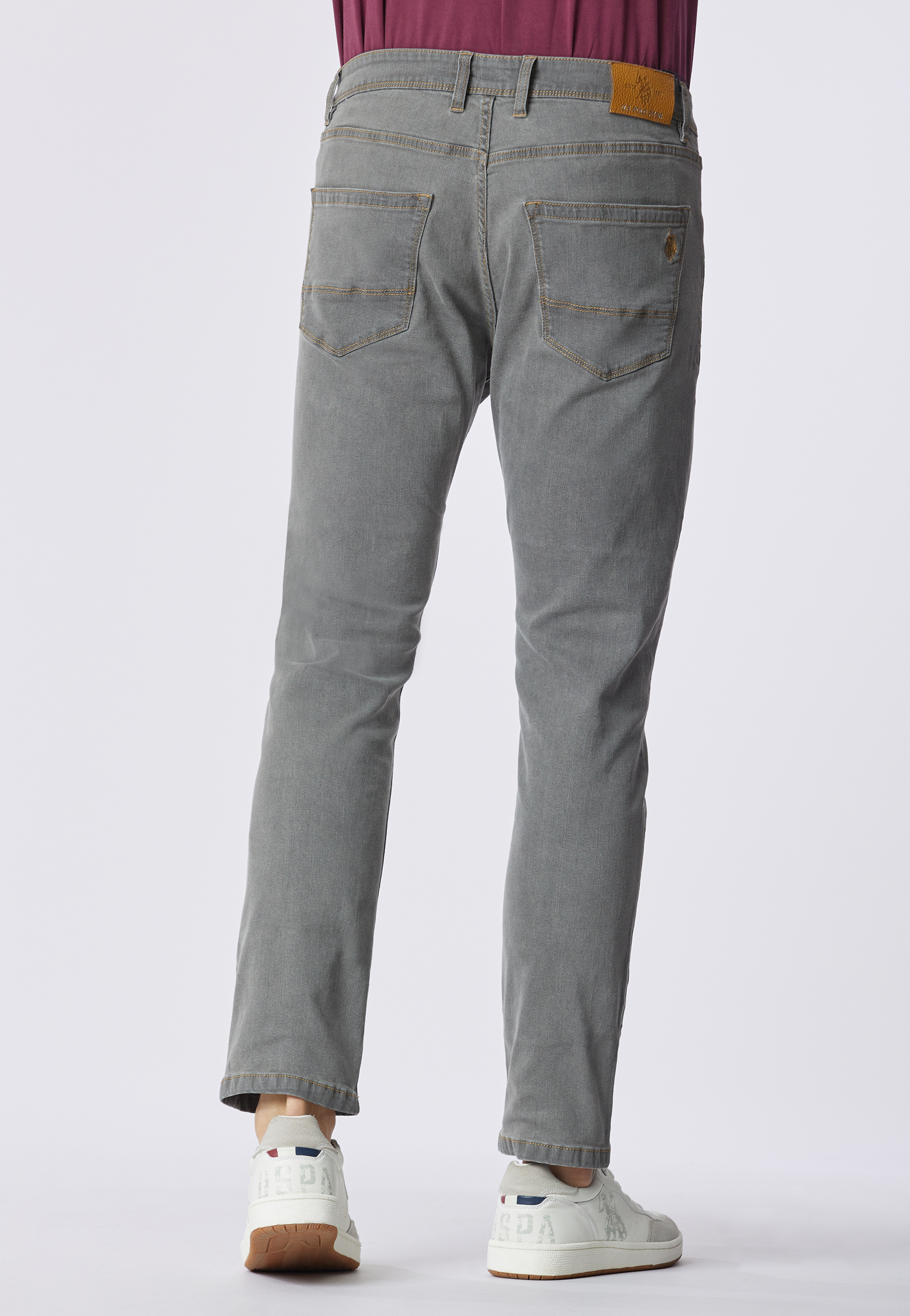 Pantalone denim cinque tasche tapered fit