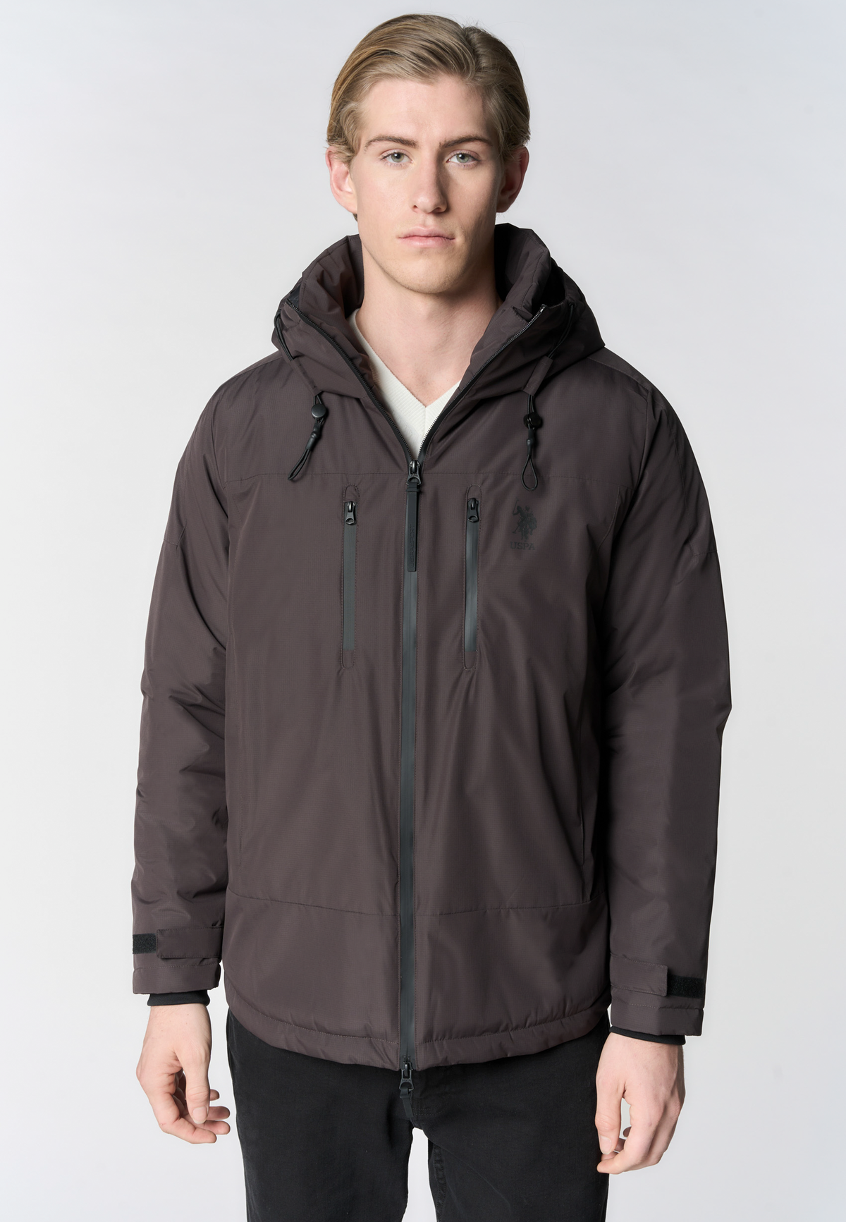 Giacca imbottita con cappuccio e tasche con zip