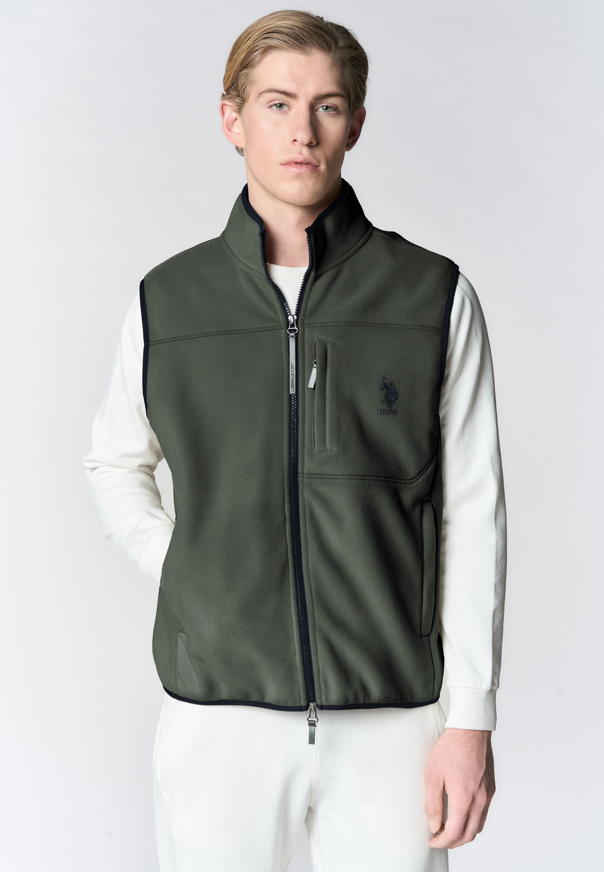 Gilet in pile bicolore con collo alto e tasche con zip