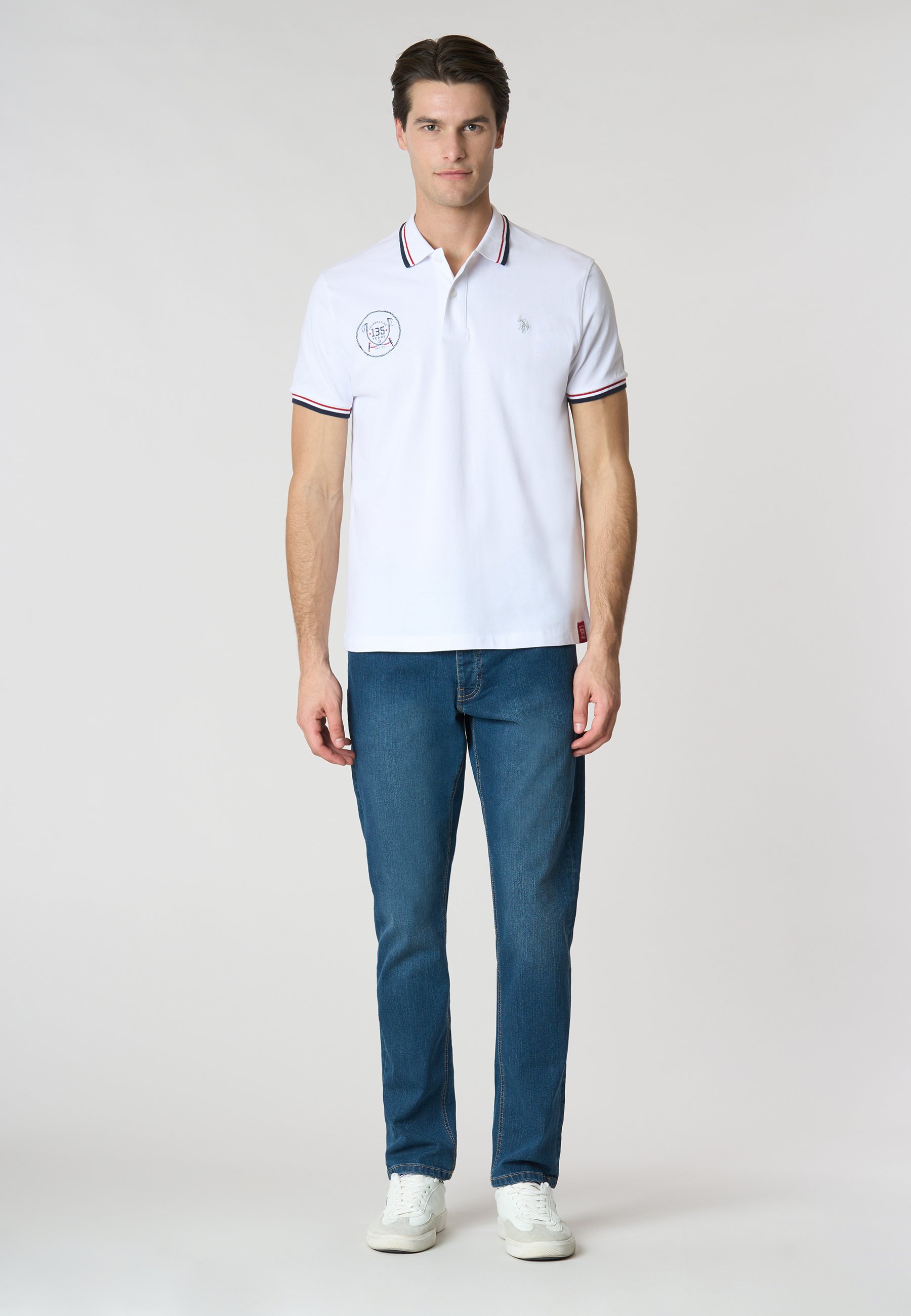 Polo a maniche corte "135th Anniversary" in cotone piquet con colletto e giromanica a coste