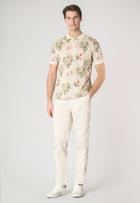 Polo shirt a maniche corte in cotone piquet con fantasia floreale e logo