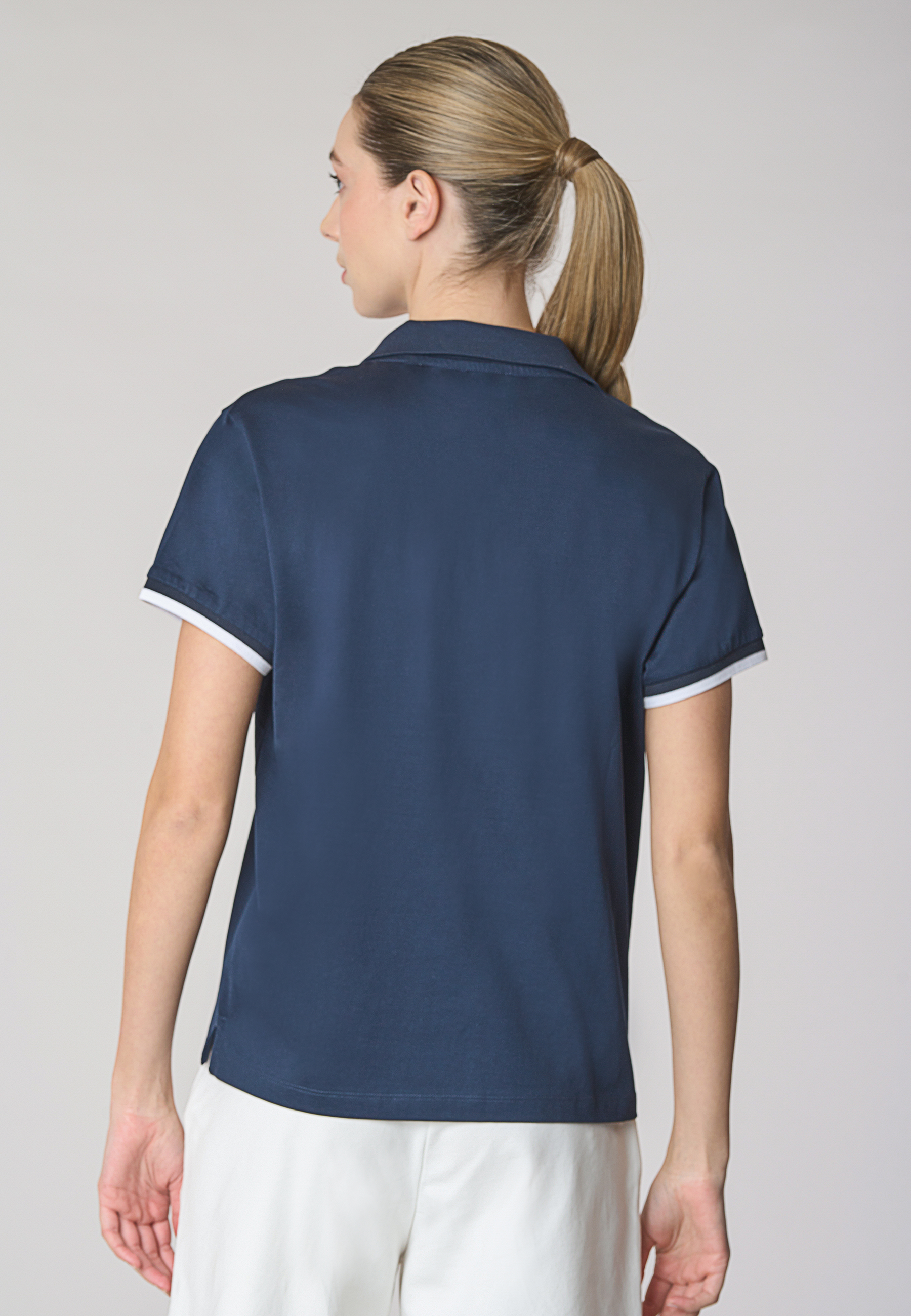 Polo shirt a maniche corte con scollo a V in cotone stretch