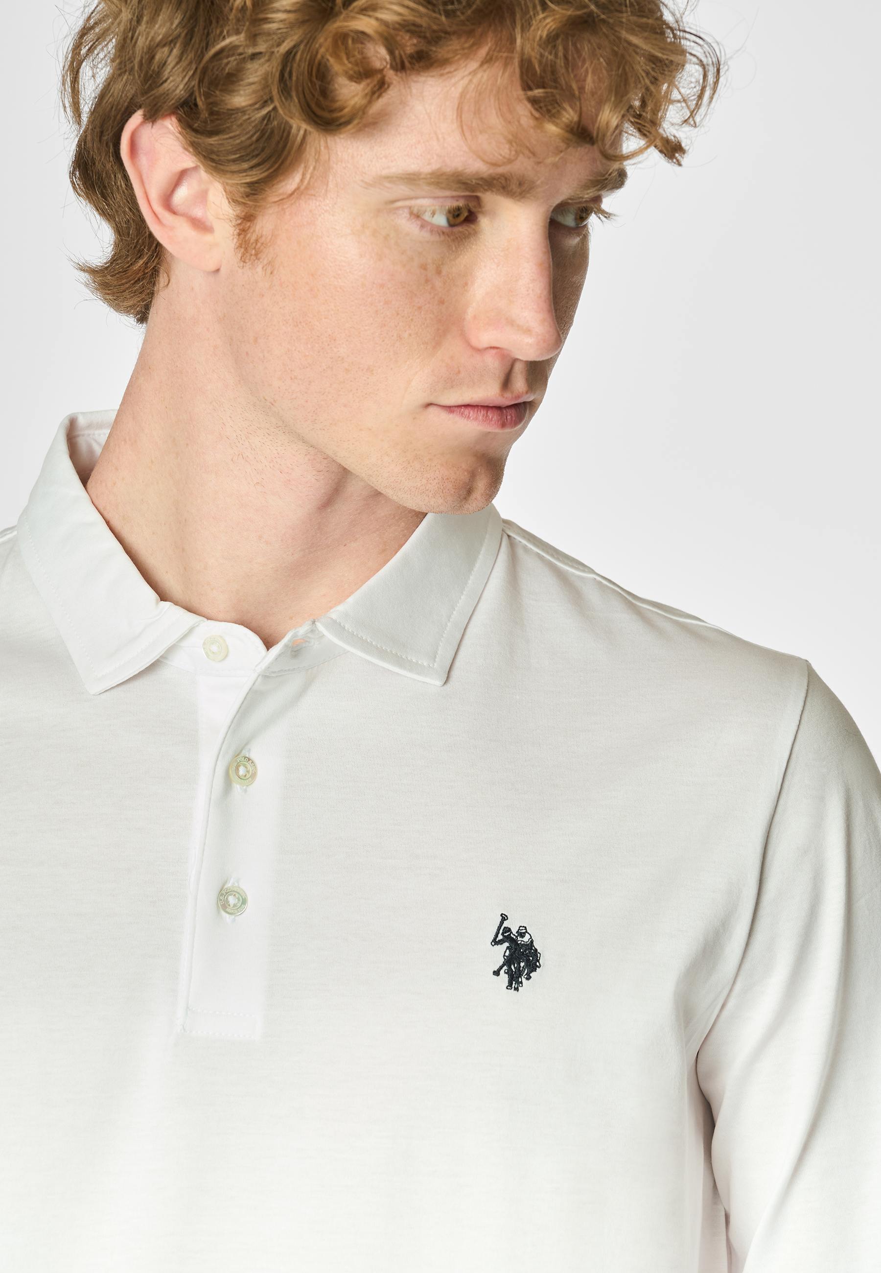 Polo shirt a maniche lunghe in cotone premium quality con logo e bottoni sulle maniche