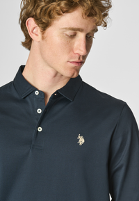 Polo shirt a maniche lunghe in cotone premium quality con logo e bottoni sulle maniche