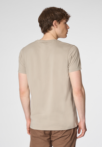 T-shirt a maniche corte in cotone overdyed con logo