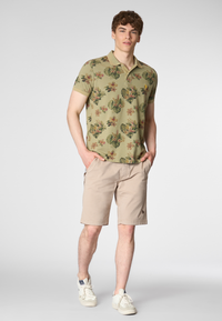 Polo shirt a maniche corte in cotone piquet con fantasia floreale e logo