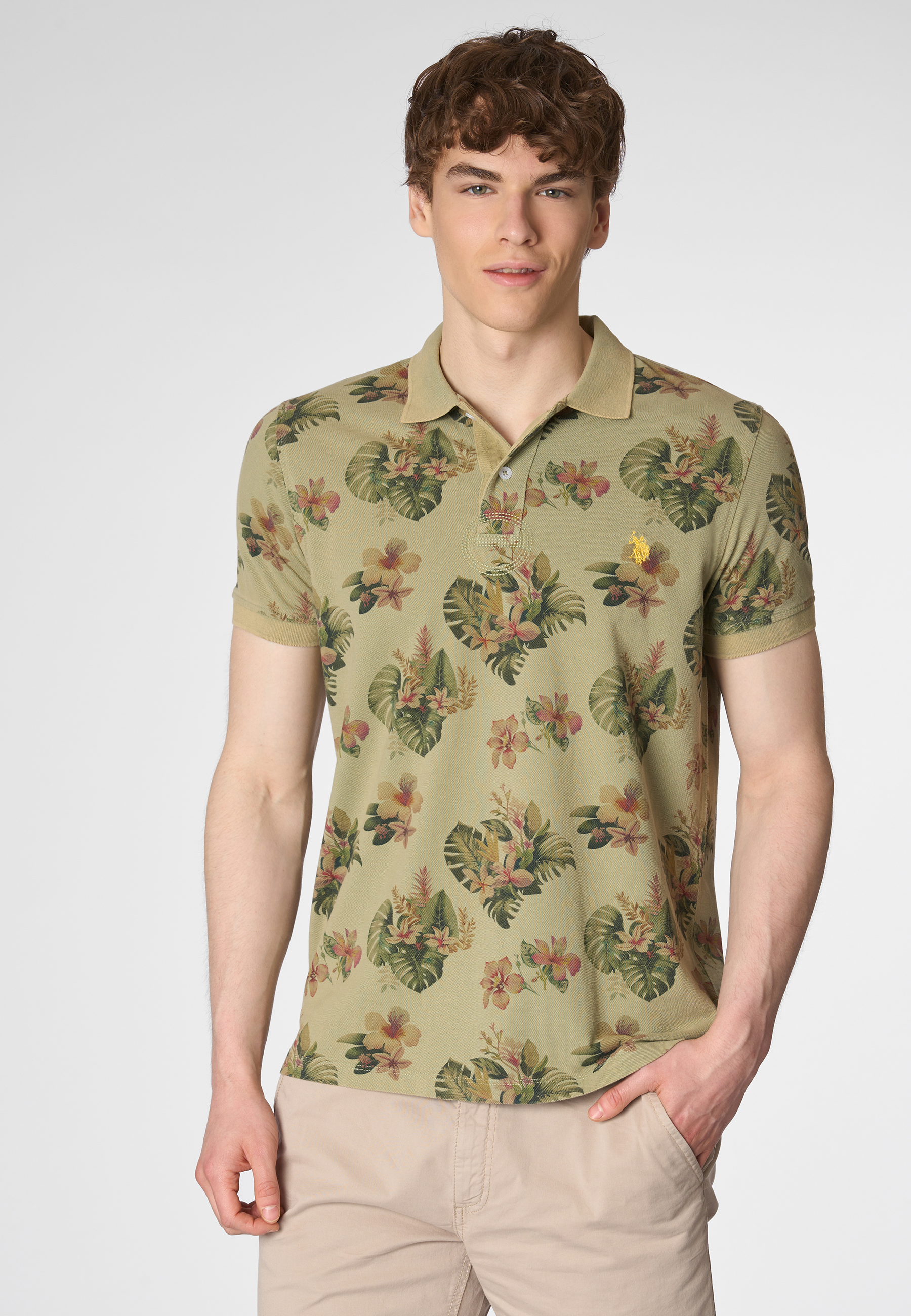 Polo shirt a maniche corte in cotone piquet con fantasia floreale e logo