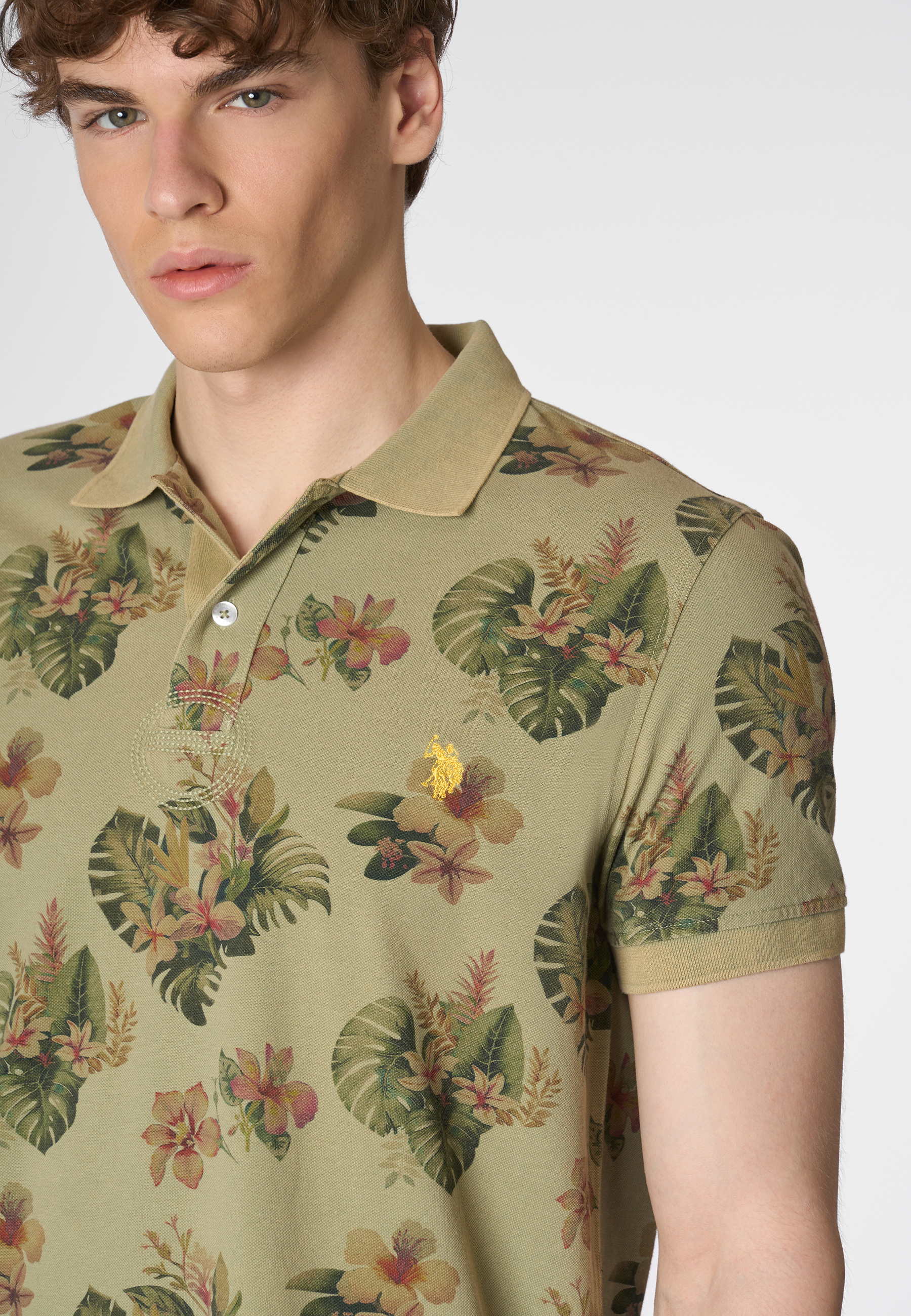Polo shirt a maniche corte in cotone piquet con fantasia floreale e logo