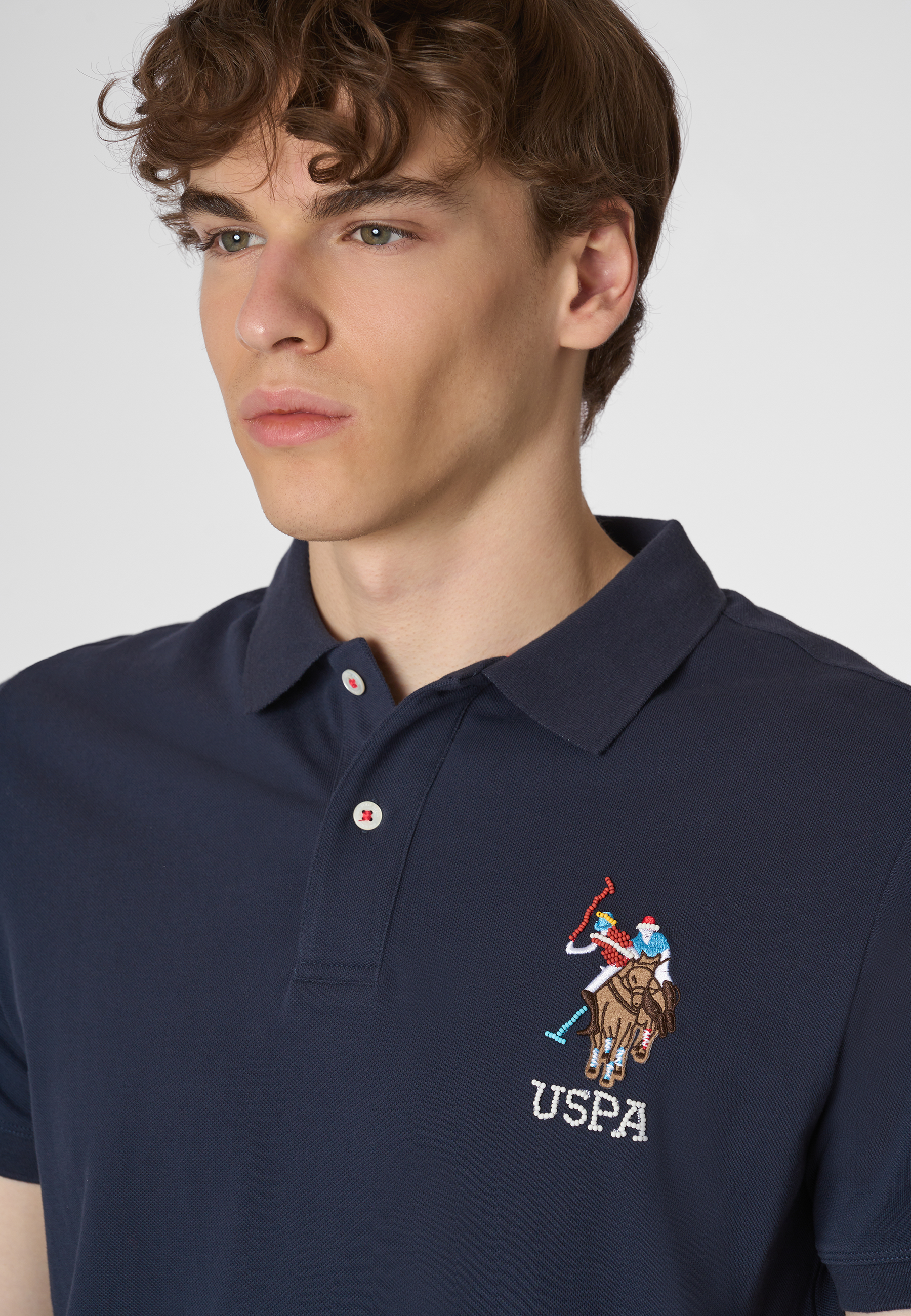 Polo shirt a maniche corte in cotone piquet con logo colorato