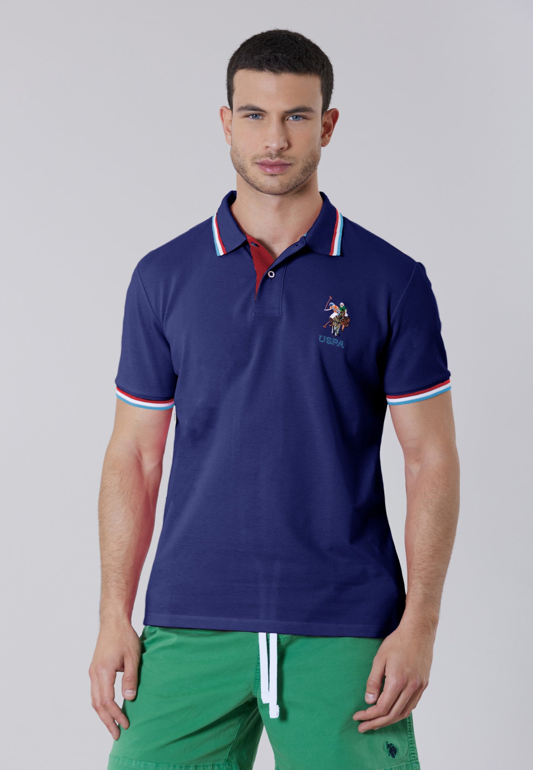 Polo a maniche corte in cotone con logo colorato e dettagli rigati