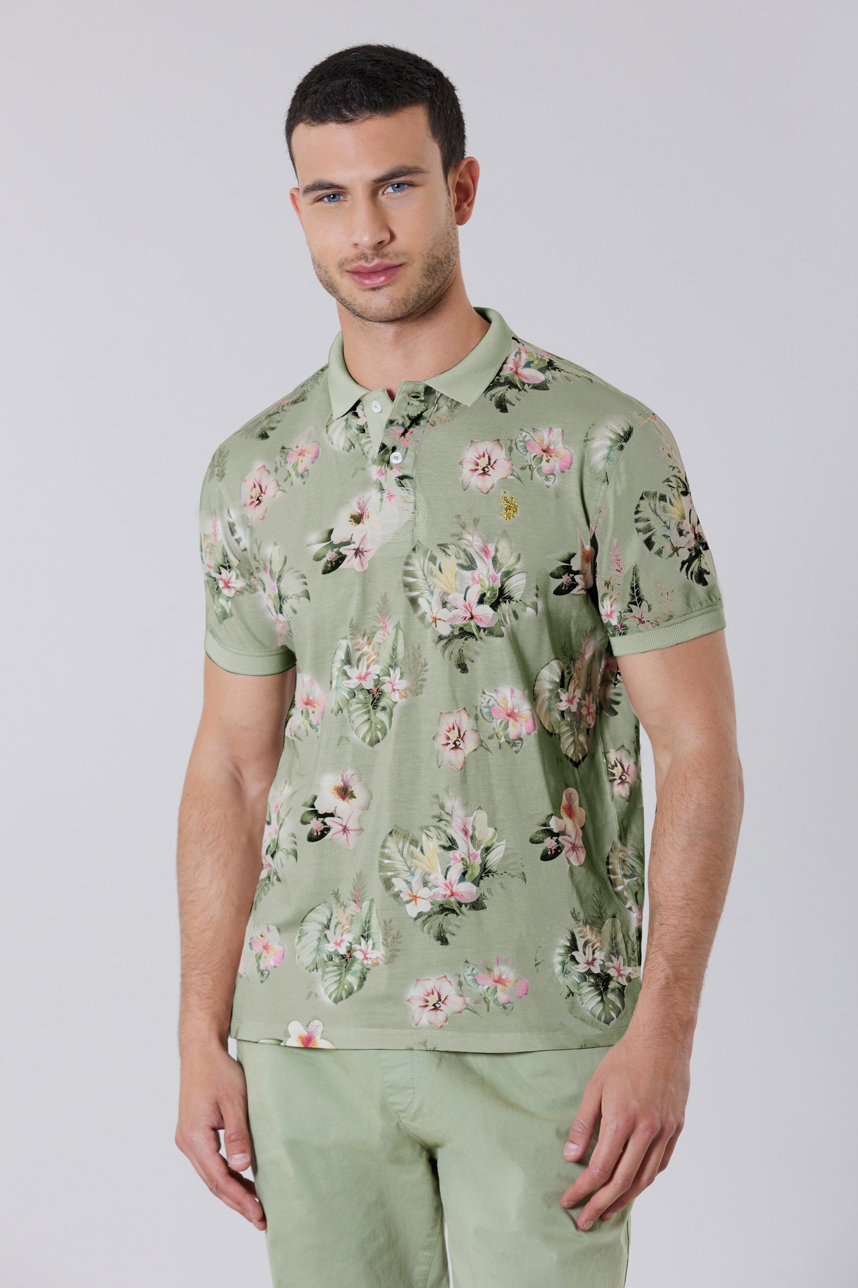 Polo shirt a maniche corte in cotone piquet con fantasia floreale e logo