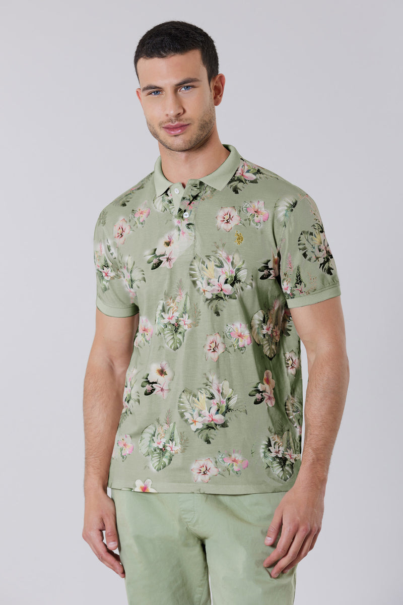 Polo shirt a maniche corte in cotone piquet con fantasia floreale e logo