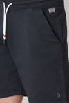 Pantaloni corti sportivi over dyed con logo