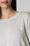 Maglia girocollo in cotone con spacchi laterali e logo