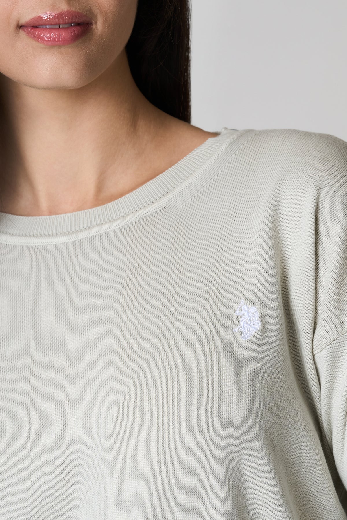 Maglia girocollo in cotone con spacchi laterali e logo