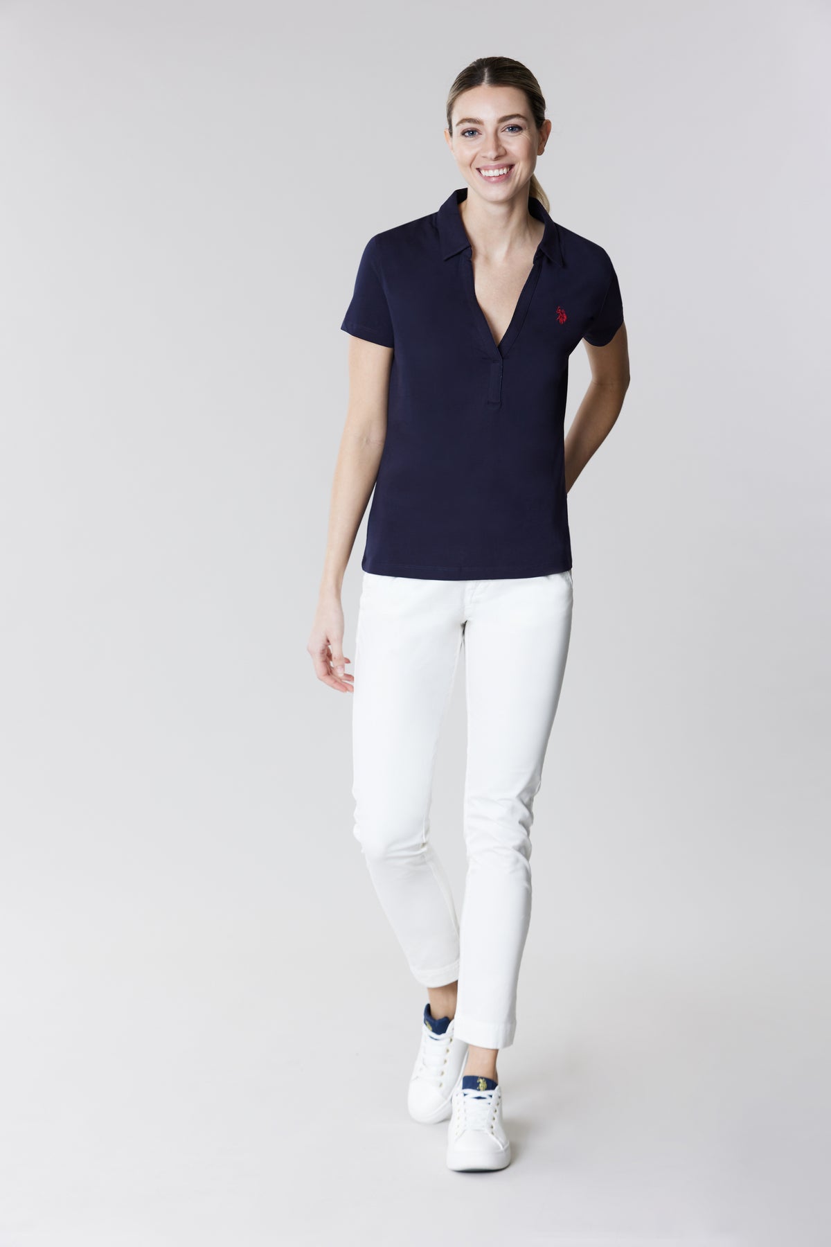 Polo a maniche corte con scollo a V in cotone stretch