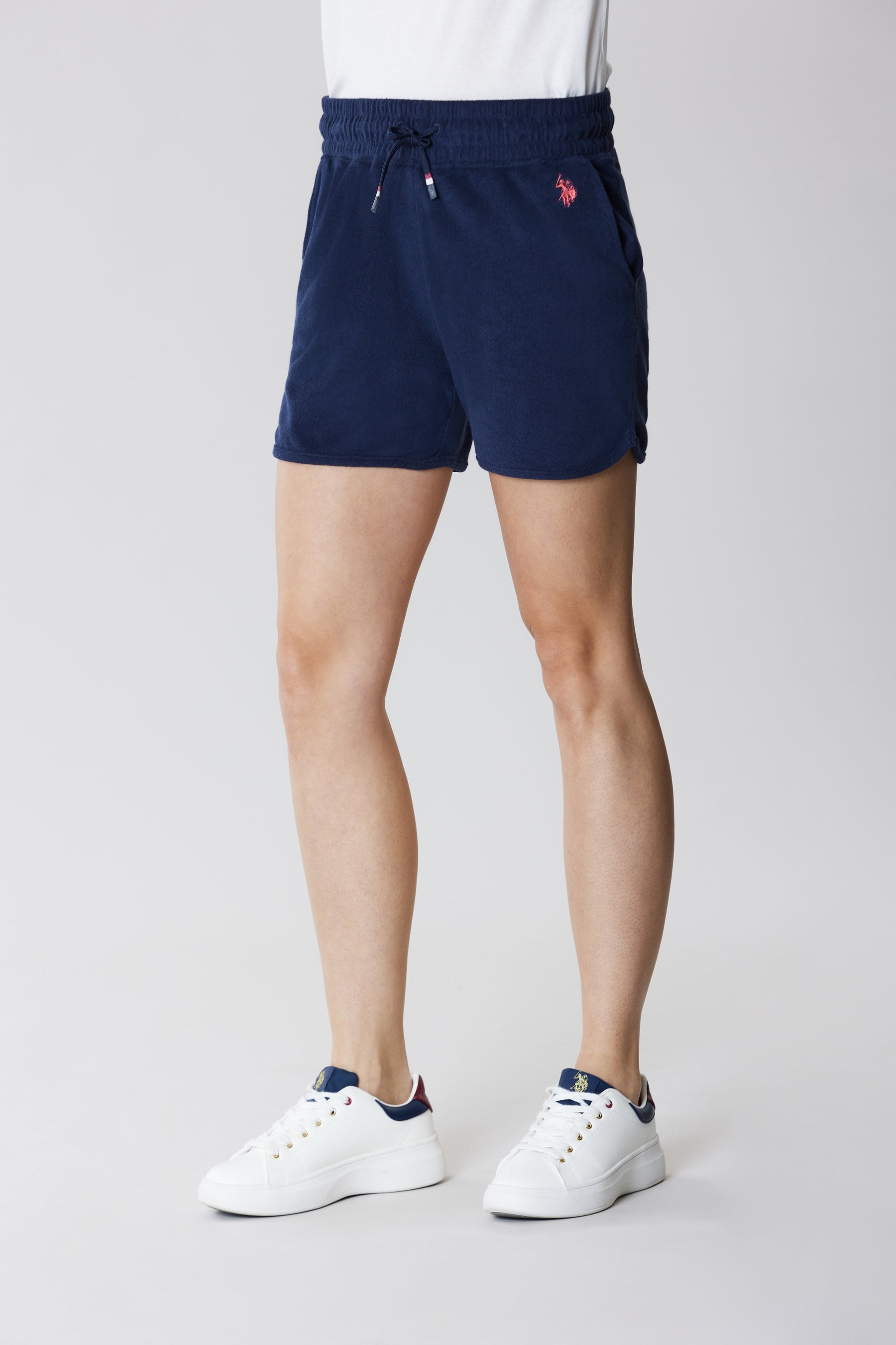 Shorts in spugna con logo