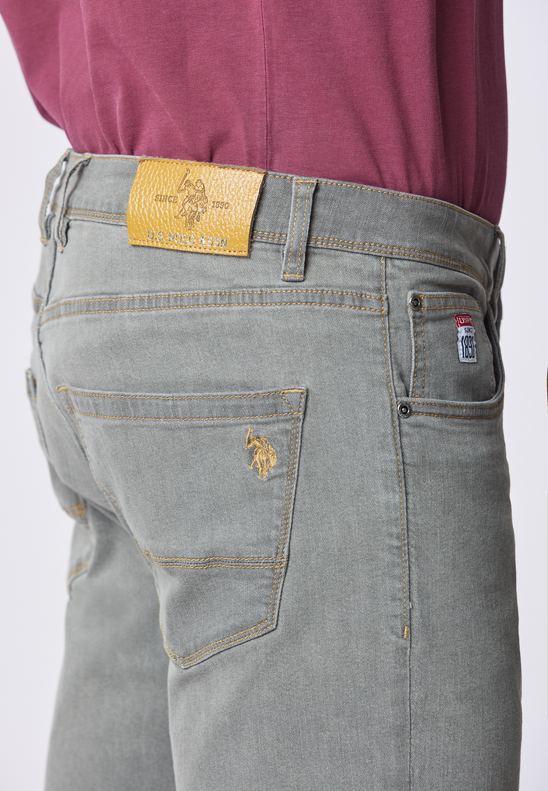 Pantalone denim cinque tasche tapered fit