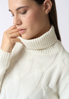 Maglia dolcevita a treccia