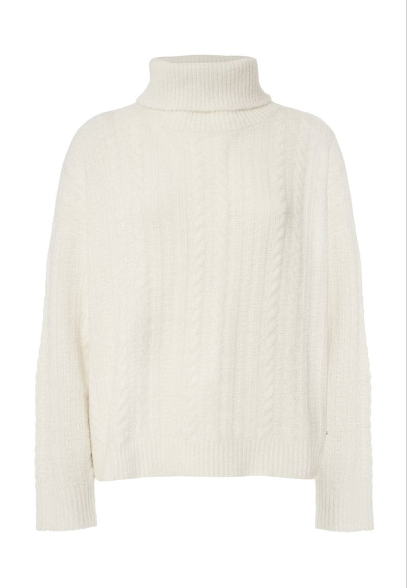 Maglia dolcevita lavorazione a spiga