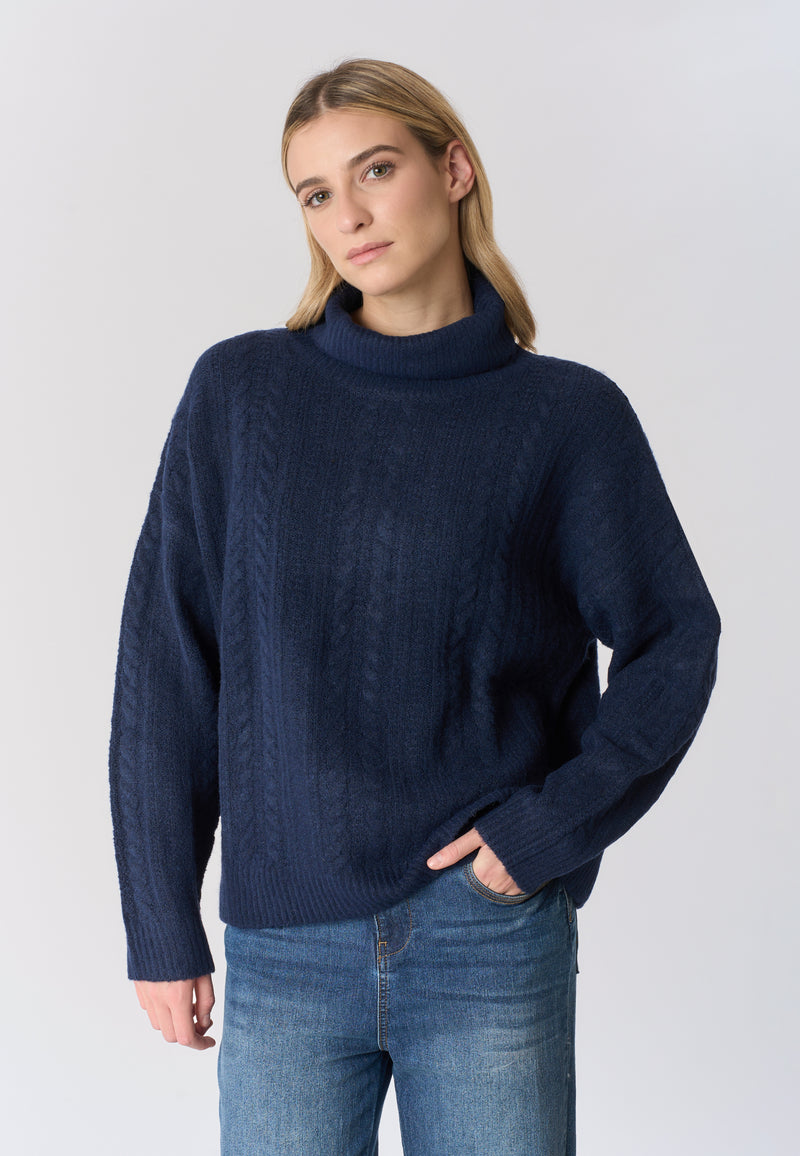 Maglia dolcevita lavorazione a spiga