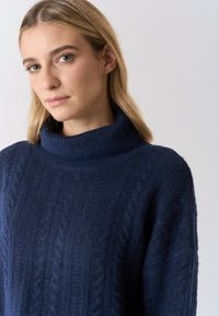 Maglia dolcevita lavorazione a spiga