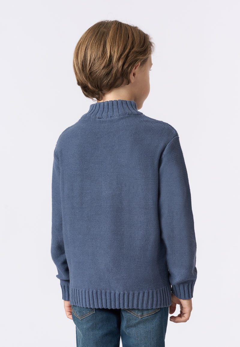 Maglia collo a lupetto lavorazione a treccia