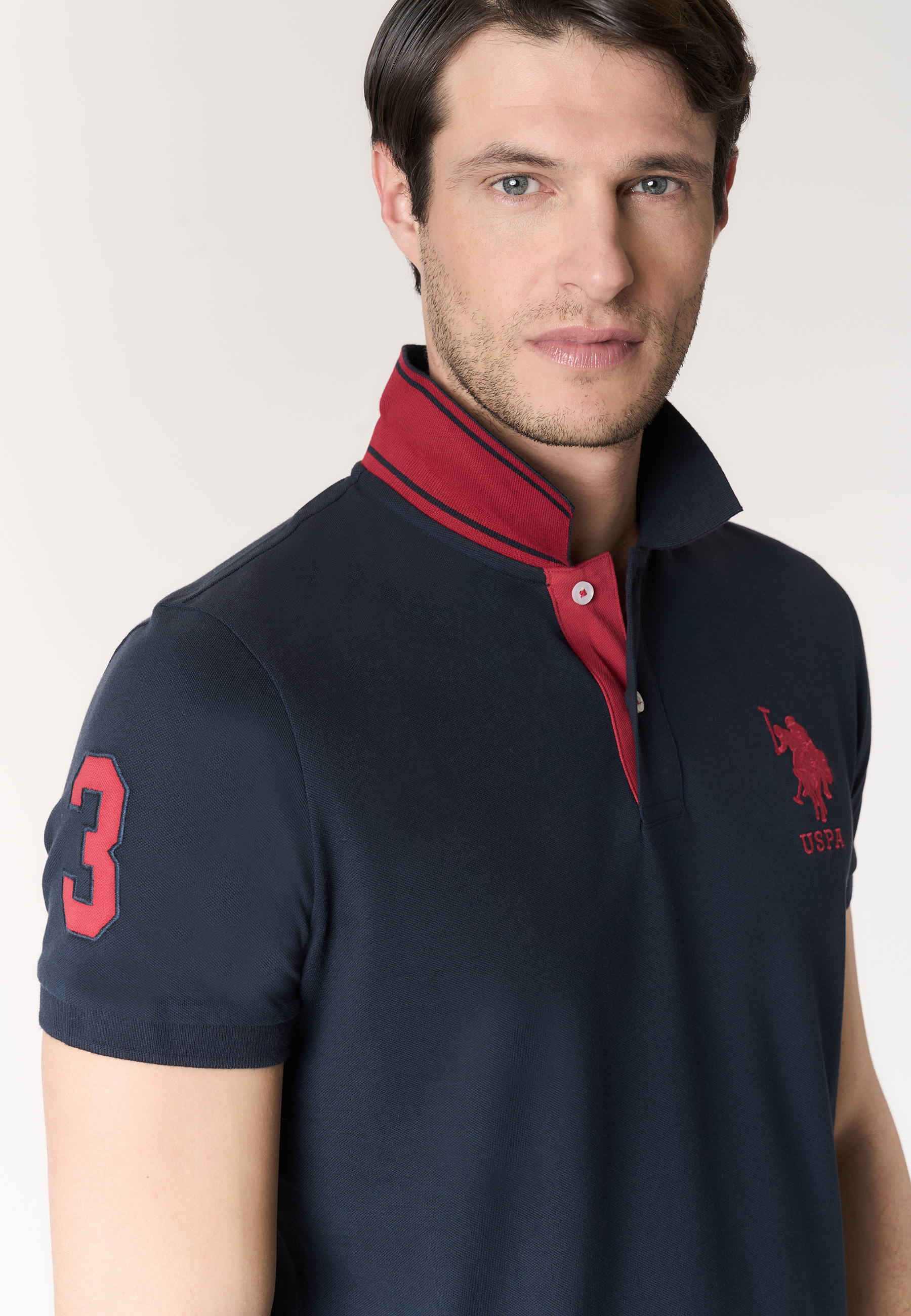 Polo shirt da uomo con logo maxi ricamato e numero