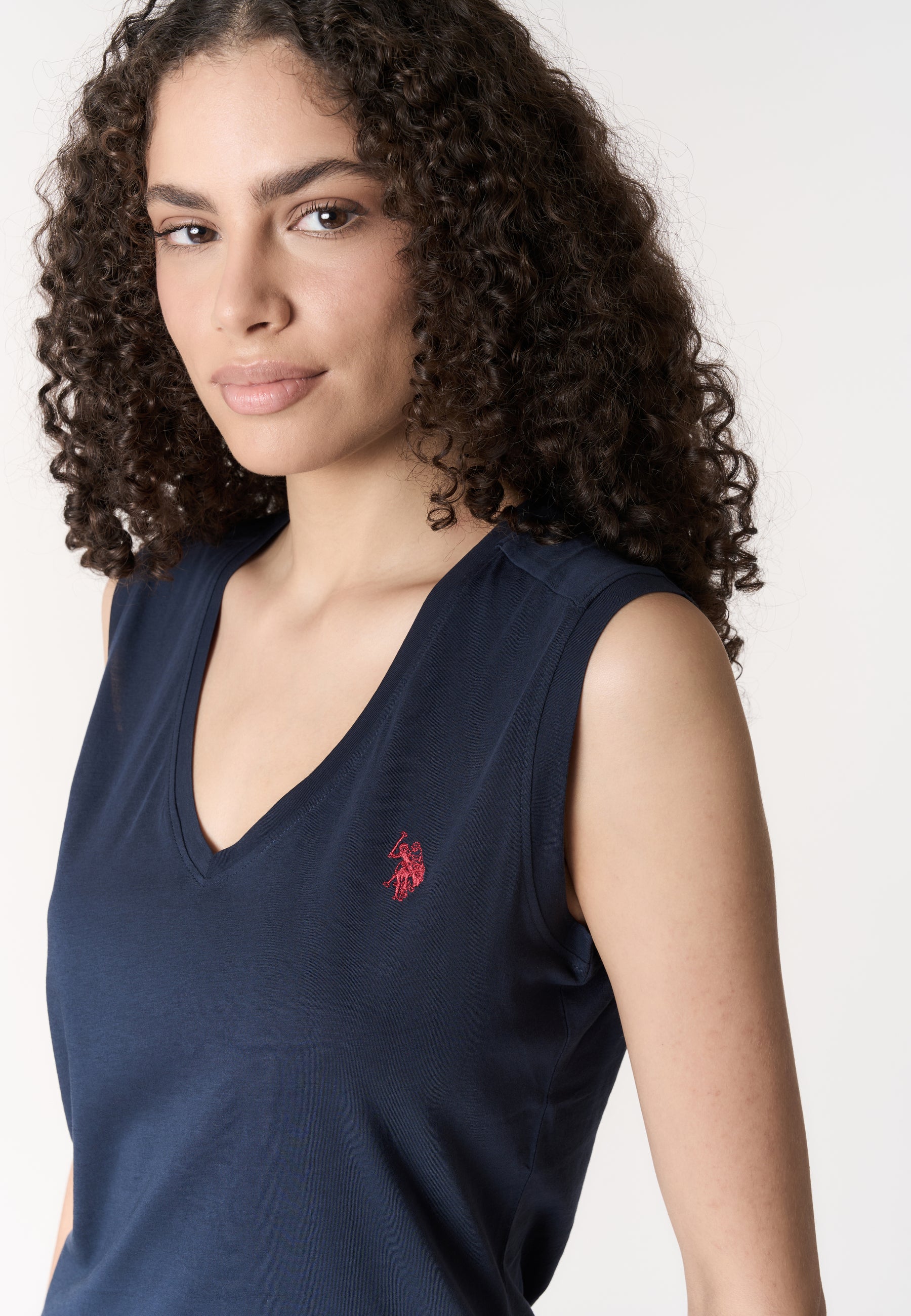 T-shirt smanicata in cotone con scollo a V