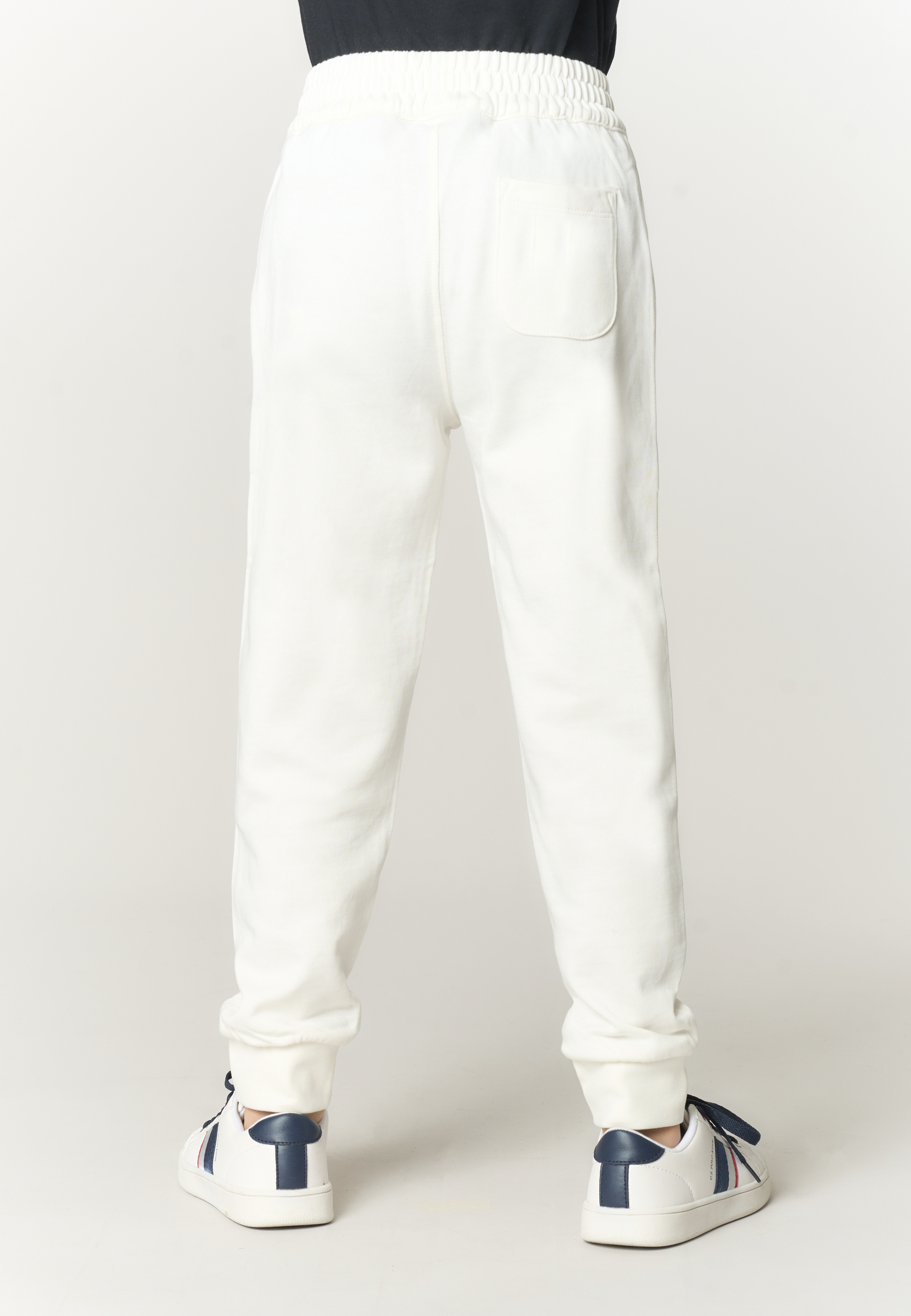 Pantalone lungo di felpa da bambino con fondo a polsino