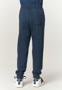 Pantalone lungo di felpa da bambino con fondo a polsino