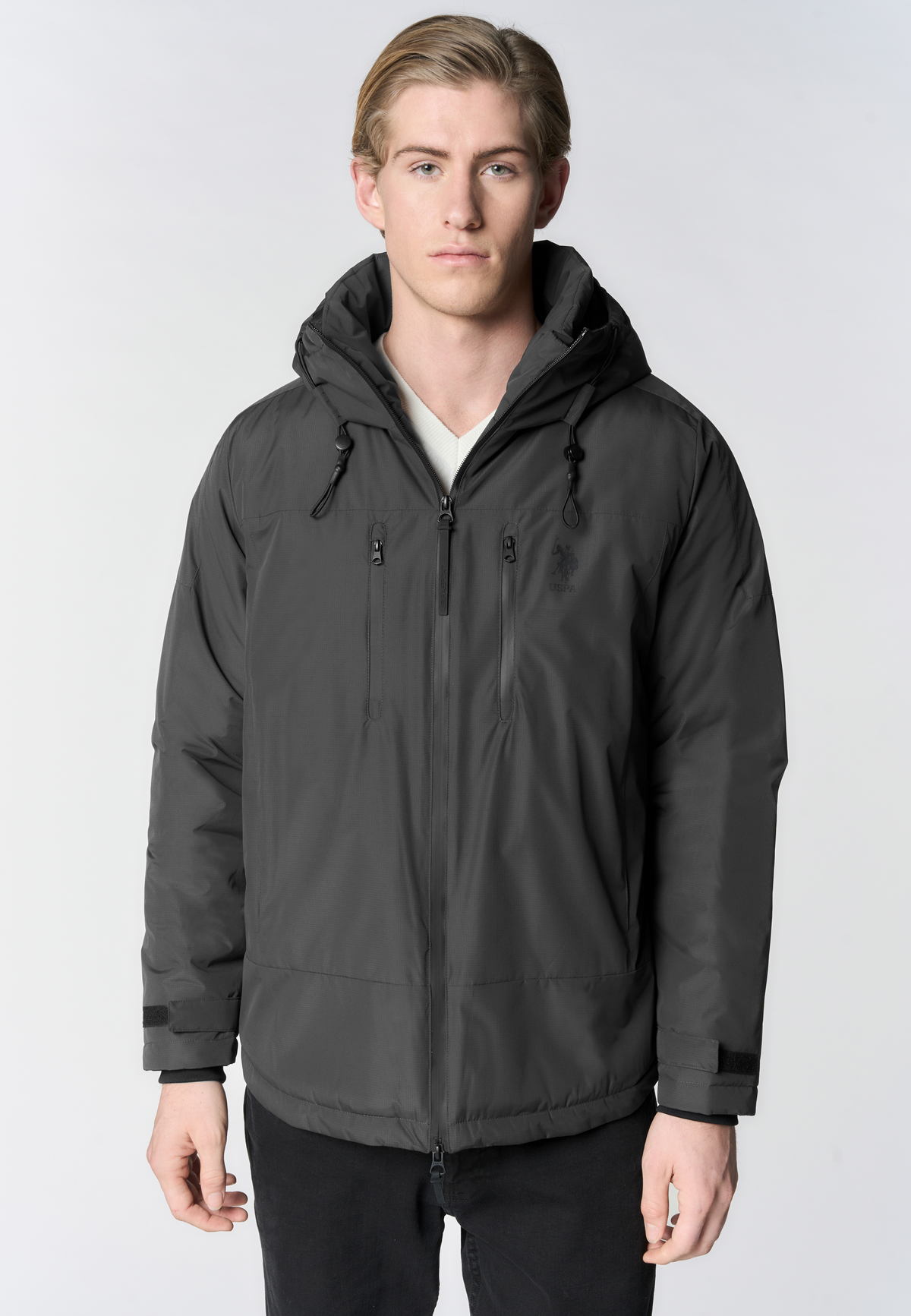 Giacca imbottita con cappuccio e tasche con zip