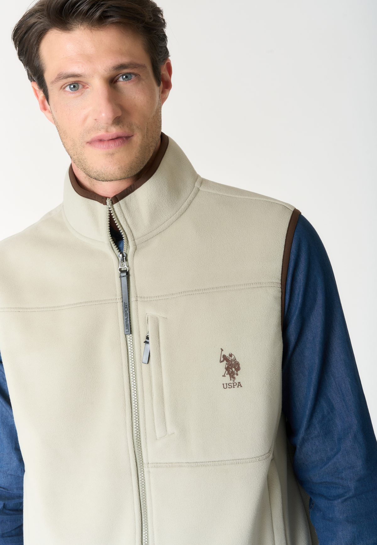 Gilet in pile bicolore con collo alto e tasche con zip