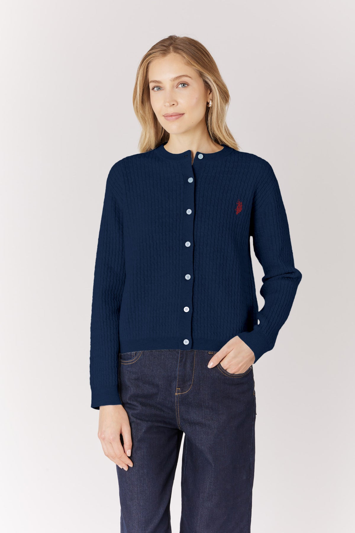 Cardigan in lana merino con lavorazione a trecce