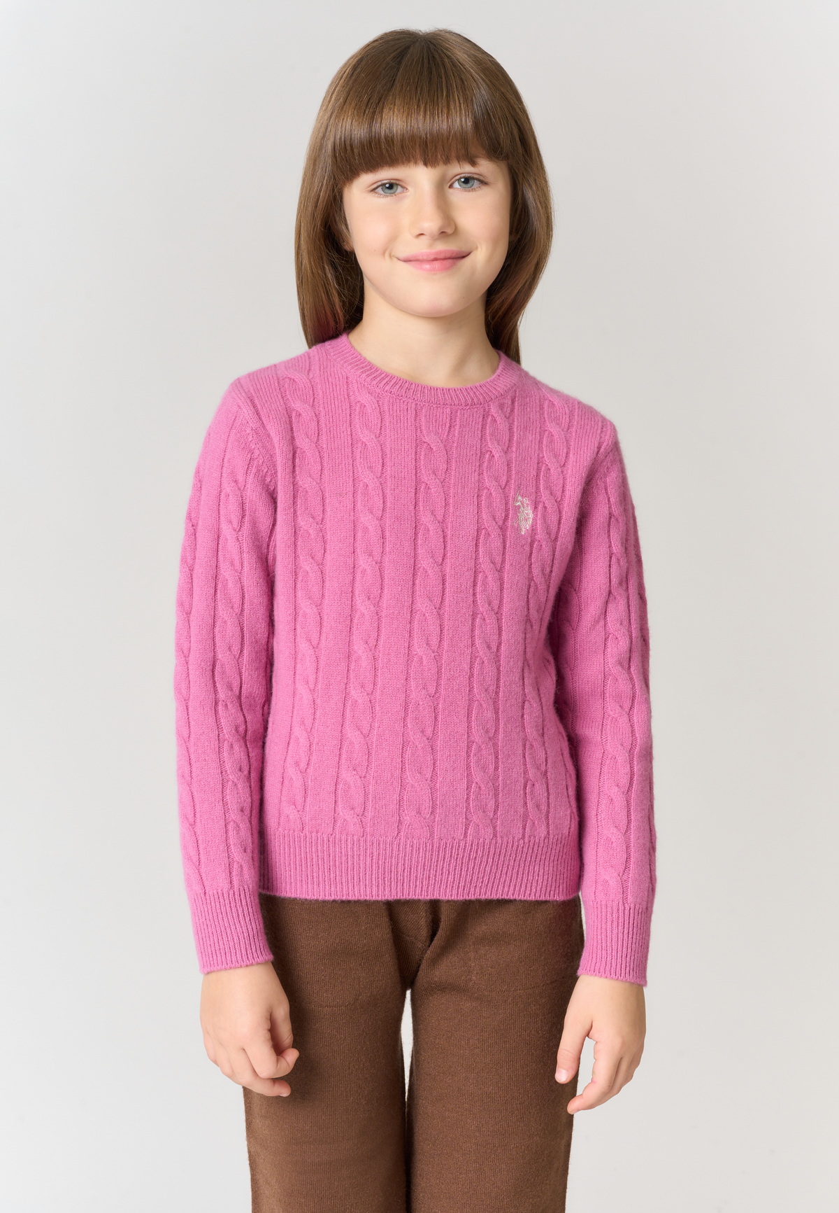 Maglia da bambina in lana con lavorazione a trecce