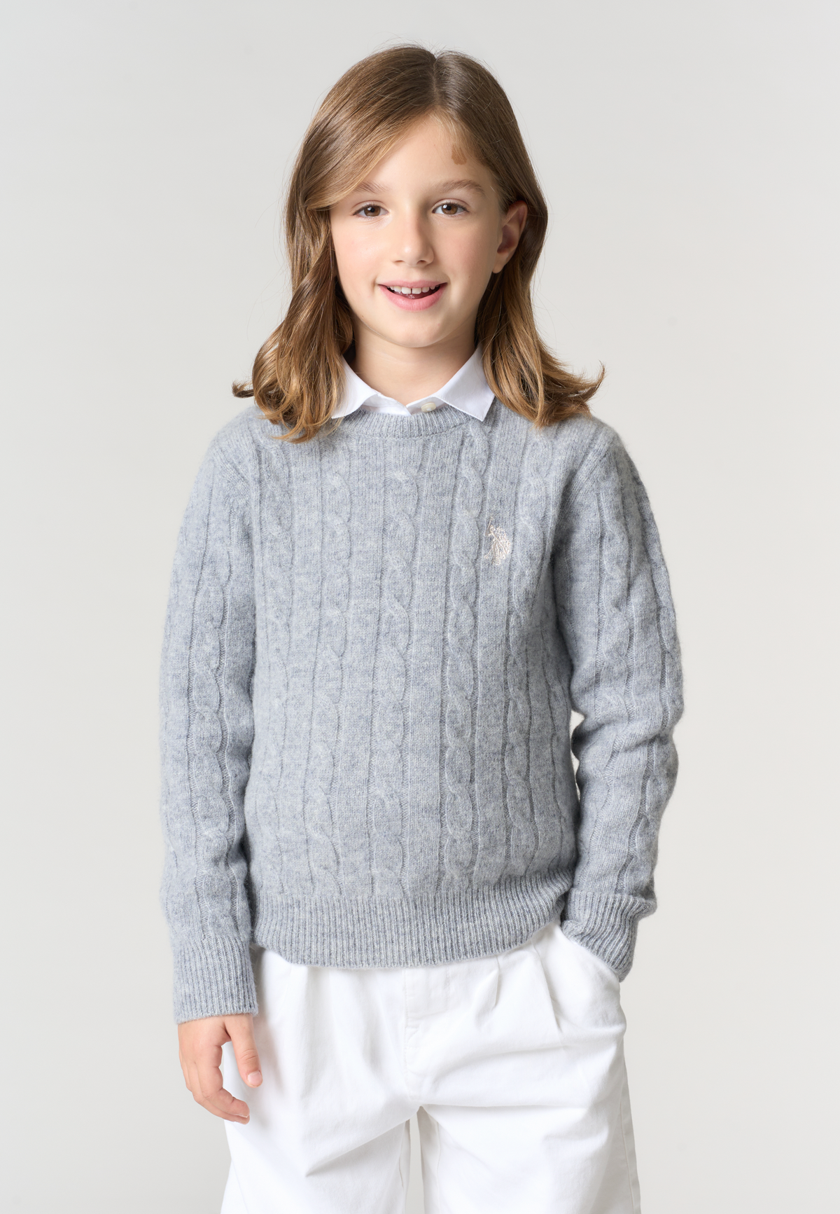 Maglia da bambina in lana con lavorazione a trecce