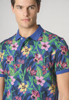 Polo a maniche corte in cotone piquet con fantasia tropicale e logo